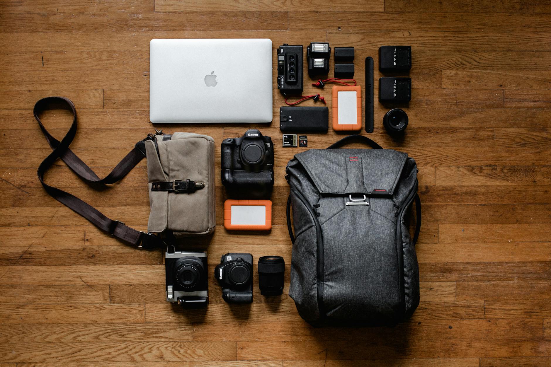 top view photo gadgets on hardwood floor